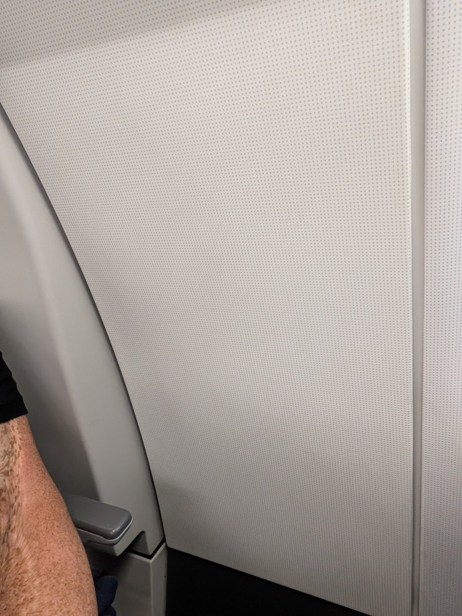 Lootch13's tweet photo. Paid for a premium economy seat on a cross country flight and this is what I get. No window and narrower seats. What the hell @AmericanAir ? https://t.co/Fz3eqB9xIW