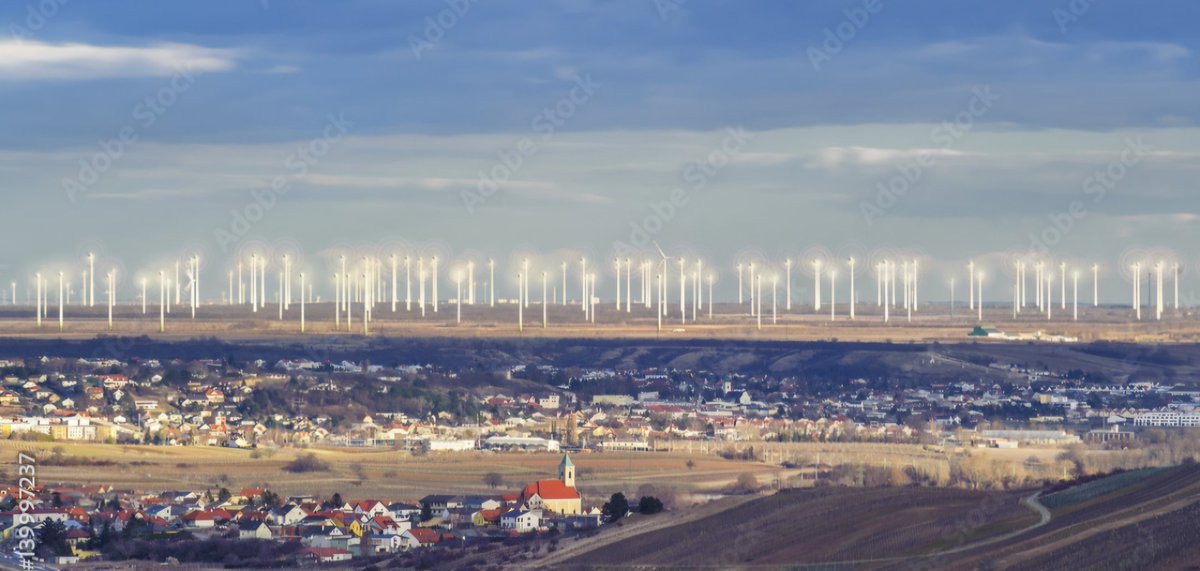 Uncaringparent's tweet photo. Das ist der "Windpark" Neusiedl-Weiden nahe des Neusiedler Sees. Da muss man sich nicht wundern warum das Mikroklima im Arsch ist und der See austrocknet. Ein Denkmal des Öko-Faschismus! 🤬 https://t.co/rrxNSAt77R