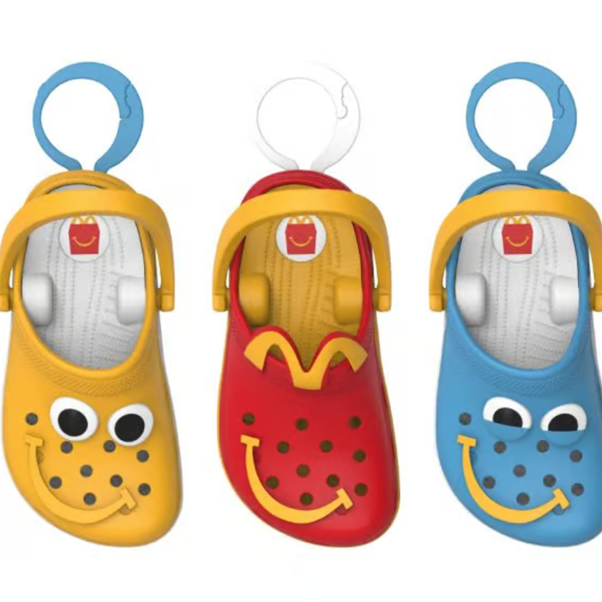Dexerto's tweet photo. McDonald’s has launched its first Crocs Happy Meal in the UK, giving customers 12 miniature clog keyrings to collect

You'll get one random design with each Happy Meal, so completing the full set comes down to luck https://t.co/b6RCrCBcFq