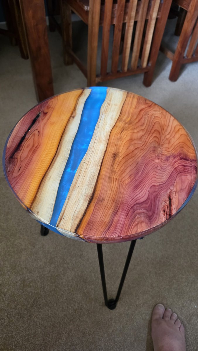 Kernow27's tweet photo. A yew and epoxy river table for a mates birthday that I missed #Woodwork #Homemade https://t.co/LfS7hXhwVJ