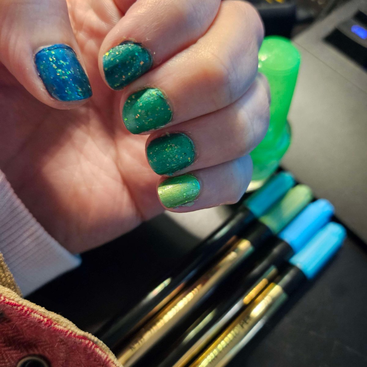 tayteroll's tweet photo. Painted my nails with acrylic markers and a top coat of sparkle. Im 43 years old.  And I'll still be doing this stupid shit for fun when Im 83 baby!  💙💚 https://t.co/62GOrE4trO