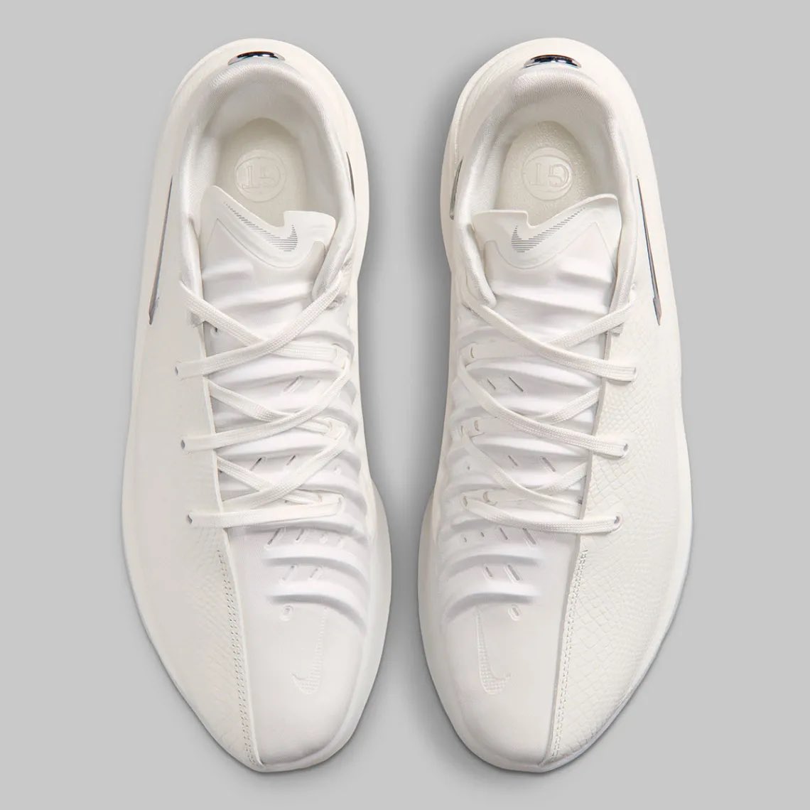 bueckerstyle's tweet photo. After debuting the GT Cut 4 last season, which was officially released this year, Paige is seen sporting a new colorway this morning as Nike introduces the shoe to their White Label series today 👟🤍 https://t.co/jm0TvZRjrn
