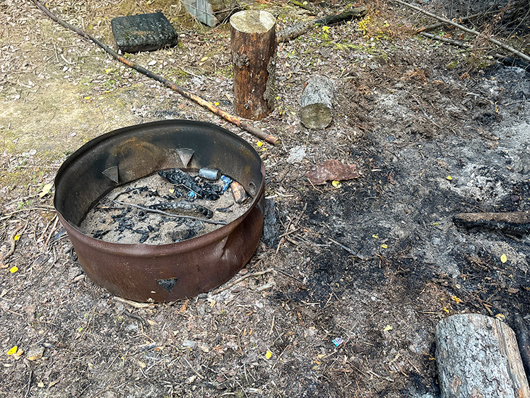 AlbertaWildfire's tweet photo. A campfire might look like it’s out, but hidden heat can remain beneath the ashes for hours. 

Before you leave your campsite, make sure your campfire is completely extinguished. 

Soak it with plenty of water, stir it and soak it again until everything is cool to the touch. https://t.co/QPGFm6X3Aa
