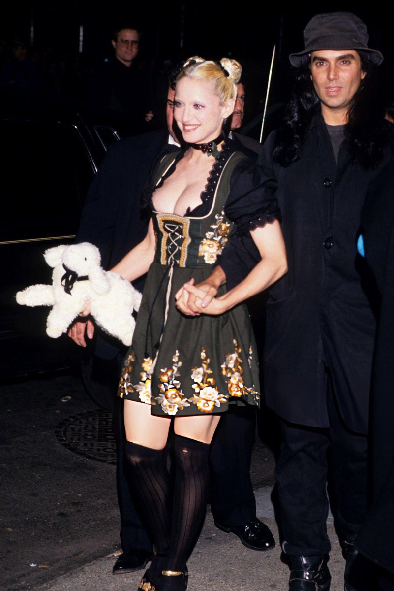 bedtimstories's tweet photo. madonna with steven meisel at the "sex book" party (1992) https://t.co/83q4U1EYcK