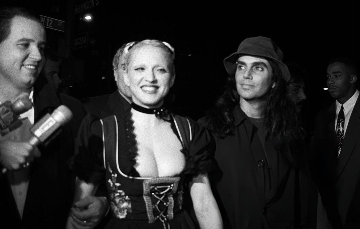 bedtimstories's tweet photo. madonna with steven meisel at the "sex book" party (1992) https://t.co/83q4U1EYcK