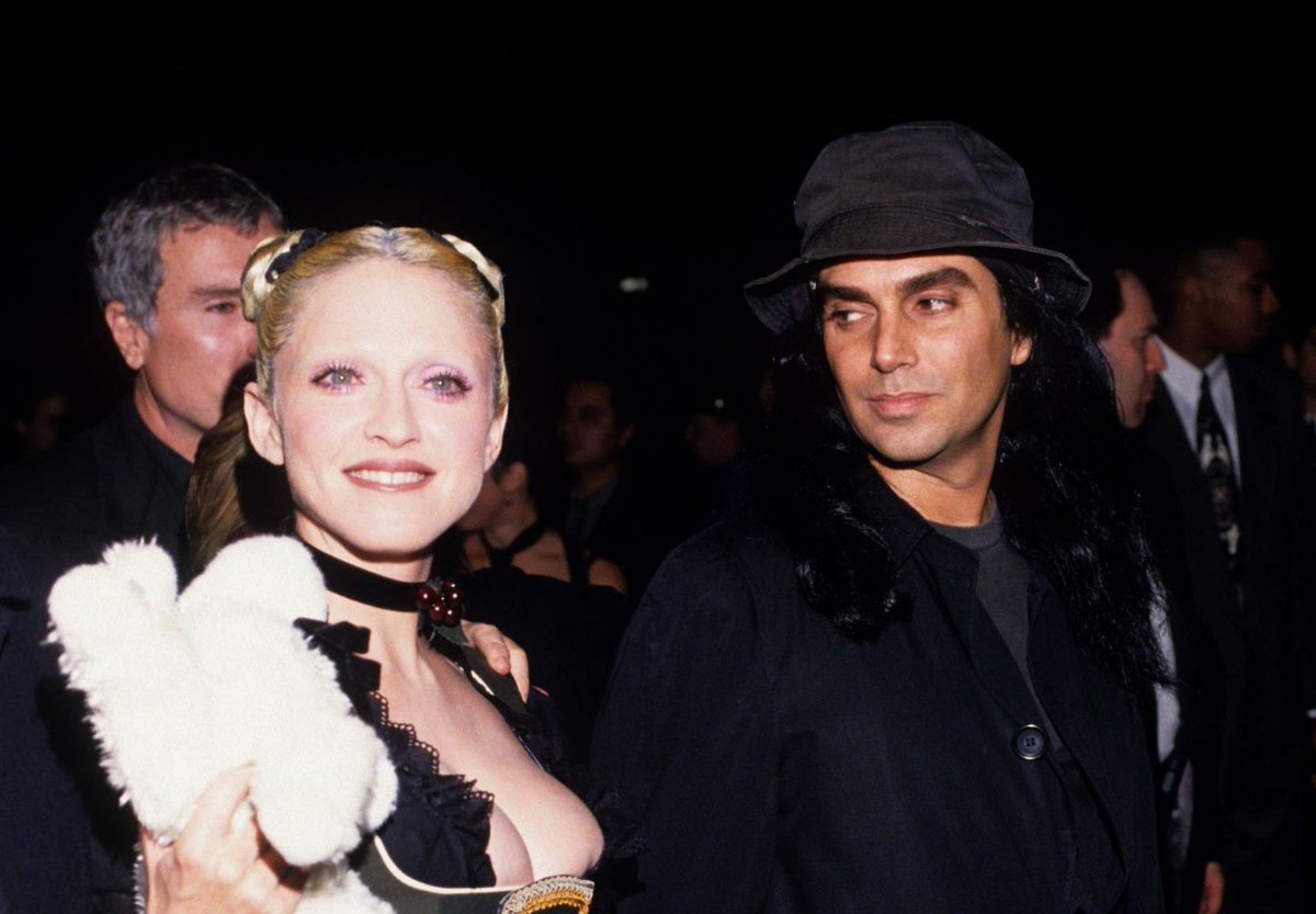 bedtimstories's tweet photo. madonna with steven meisel at the "sex book" party (1992) https://t.co/83q4U1EYcK