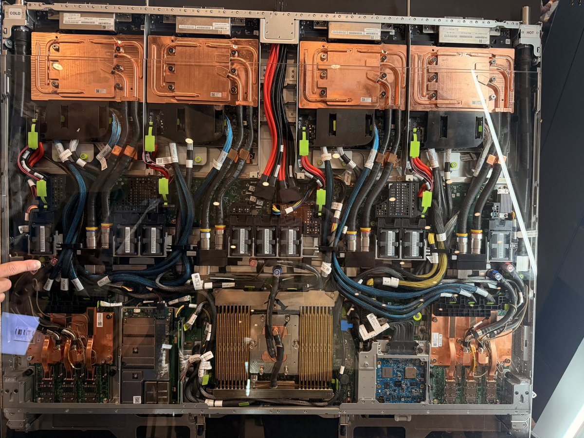BenBajarin's tweet photo. Meant to post some of these yesterday when I had some time on the floor at AMD event.  And of course I took some macros of companion silicon and analog chips :) 

MI450 and Compute/networking tray for Helios.  

I also got some commentary from execs on the Helios form factor design and why they went with a double wide.