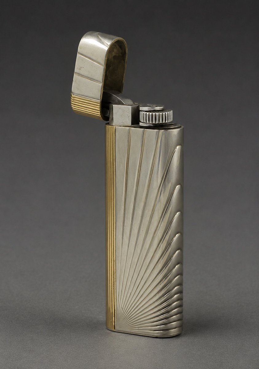 luusssso's tweet photo. Vintage Cartier lighter designs >> https://t.co/IMhbKL8zBn