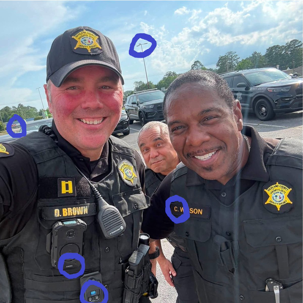 DJinFla's tweet photo. @RCSD Great pic!! The deputy between Capt. Brown & Sgt. Wilson could be Ed Asner's brother! lol Stay safe out there. #RCSD #SpotTheDifferences https://t.co/jr2jWFYxGq