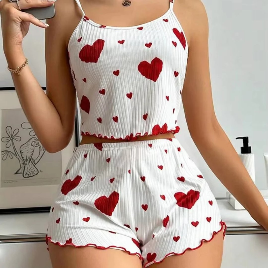 Buzz_Meter's tweet photo. 🩷 Printed heart pajama set (crop top + shorts), soft &amp; perfect for summer, available in S-M-L. Sleep in style ✨

#WomensPajama #PajamaSet #SummerPajama #Sleepwear #CropTopAndShors https://t.co/t2pVs0pZLM