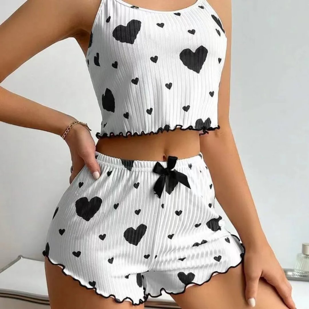 Buzz_Meter's tweet photo. 🩷 Printed heart pajama set (crop top + shorts), soft &amp; perfect for summer, available in S-M-L. Sleep in style ✨

#WomensPajama #PajamaSet #SummerPajama #Sleepwear #CropTopAndShors https://t.co/t2pVs0pZLM