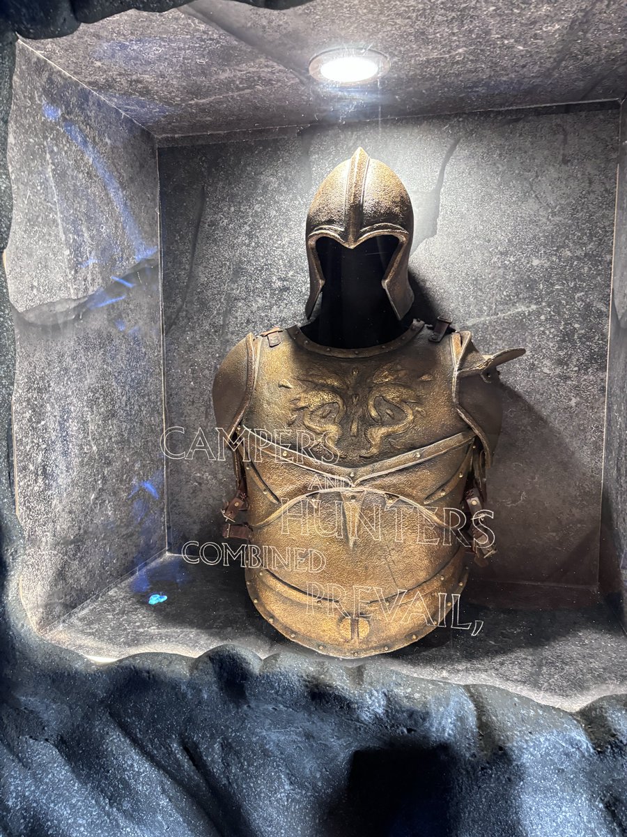 chbupdates's tweet photo. It seems like Annabeth is haunted by her past. Pictured is Backbiter, Annabeth’s armor, a bowl of golden apples, and a cracked sarcophagus. https://t.co/POdM9c0qkJ