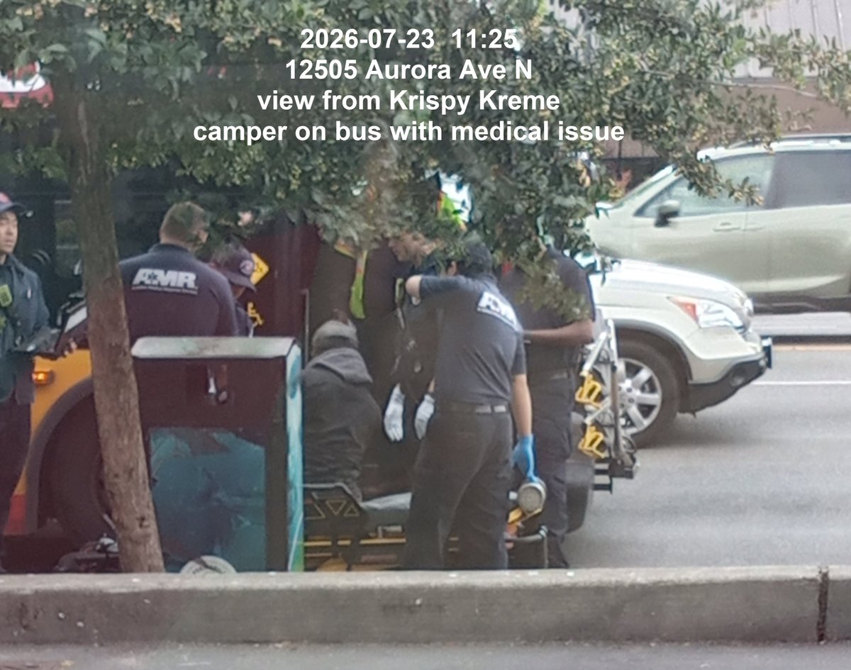 CampSiteSeattle's tweet photo. 2026-07-23  11:25 12505 Aurora Ave N in north #Seattle. 
View from Krispy Kreme.  Camper on bus with medical issue.  @MayorofSeattle @VisitSeattle https://t.co/tAAjJZsGDs