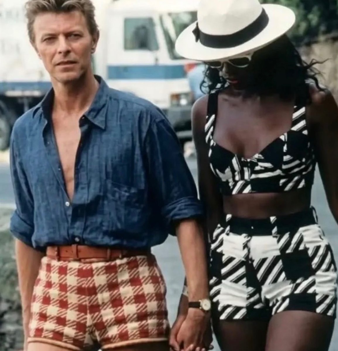 historyrock_'s tweet photo. David Bowie photographed with his wife Iman (1992) https://t.co/g7Ggm1njod