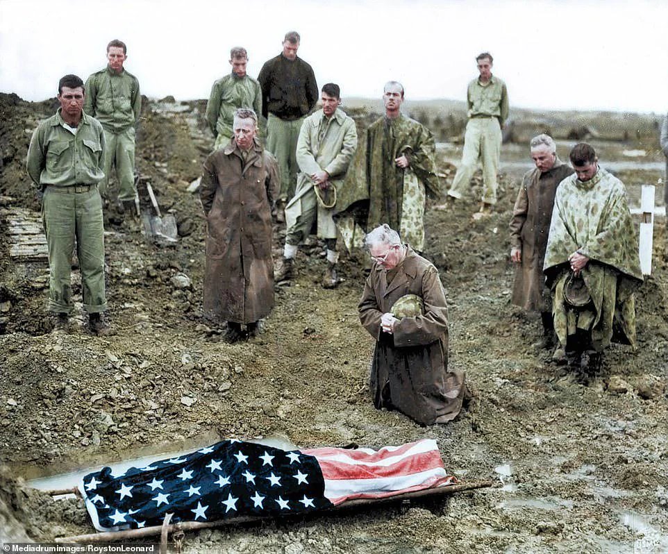 VoicesofWW2's tweet photo. This is his Father, then a Colonel, praying over the body of his son, during the battle of Okinawa. Very poignant picture. https://t.co/XOBTyzSclG