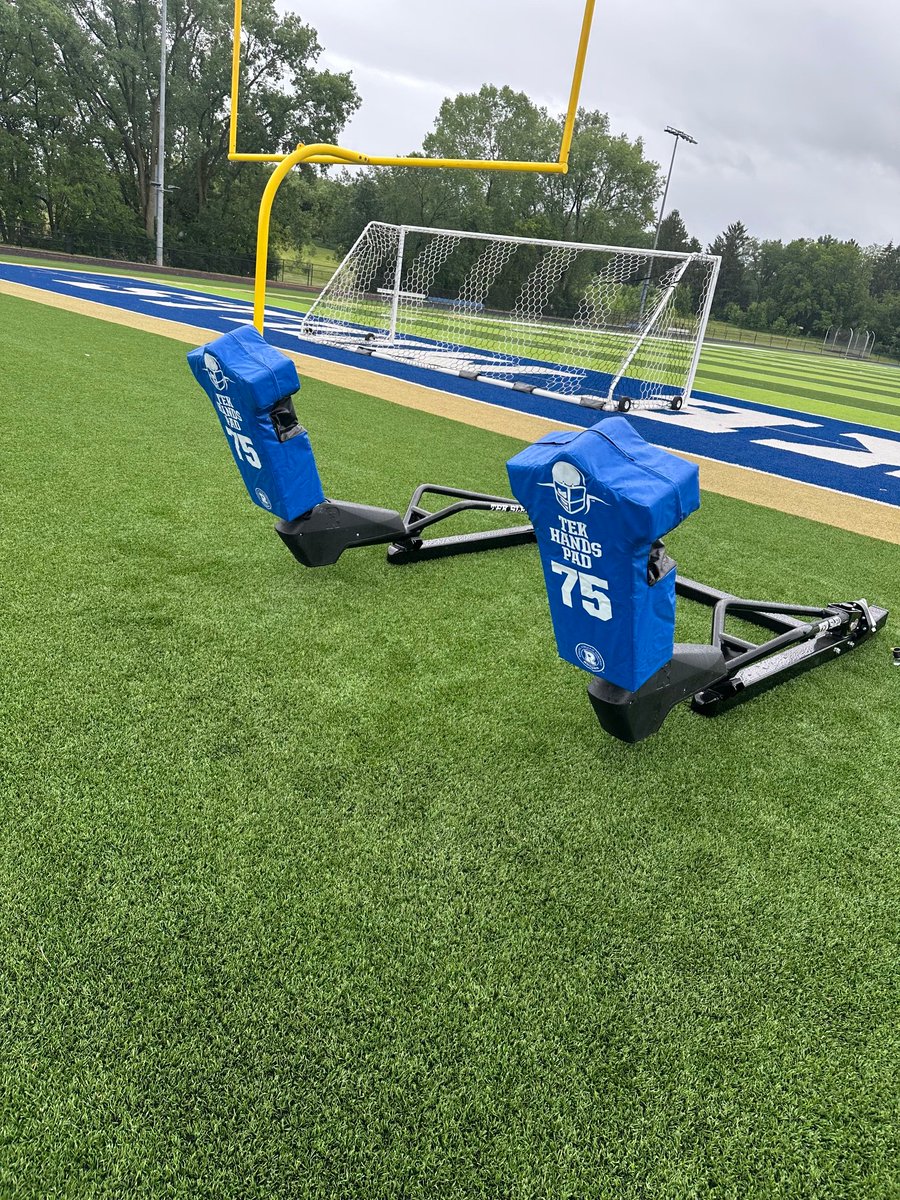 CoachHuber02's tweet photo. Fired up over some of the additions to our program this summer. 

💥Gilbert tackling equipment 
💥Equipment trailer and LM branded wrap 
💥Two man Dine Tech Sled 
💥Ball Carrier Blaster Machine 

Kids getting last names on the back of Jerseys this year as well as pride/award decals on helmets!