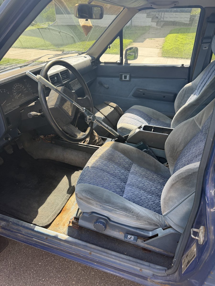 Alexgoesnorth's tweet photo. I bought a 1985 Toyota pickup for ideological reasons.

The owner’s manual says you should understand this truck as well as the people who built it. It shows you how to do EVERYTHING. 

A socket set and a Phillips screwdriver take apart 99% of it. No advanced automotive equipment or degree.

This truck is from the beginning of fuel injection, and before cars became complex computers.

And it’s blue. Actual 80s blue. Why did we stop building cars with beauty? When I restore it, this little truck will light up a road full of black, grey, and white.

This truck is borderline immortal. Thats the reason they’re the truck of choice for the Taliban. 

And finally as cars turn into surveillance devices you rent and can’t repair, a machine you fully own, understand, and can fix isn’t just nostalgia. It’s quite literally going to be the only way to remain free.