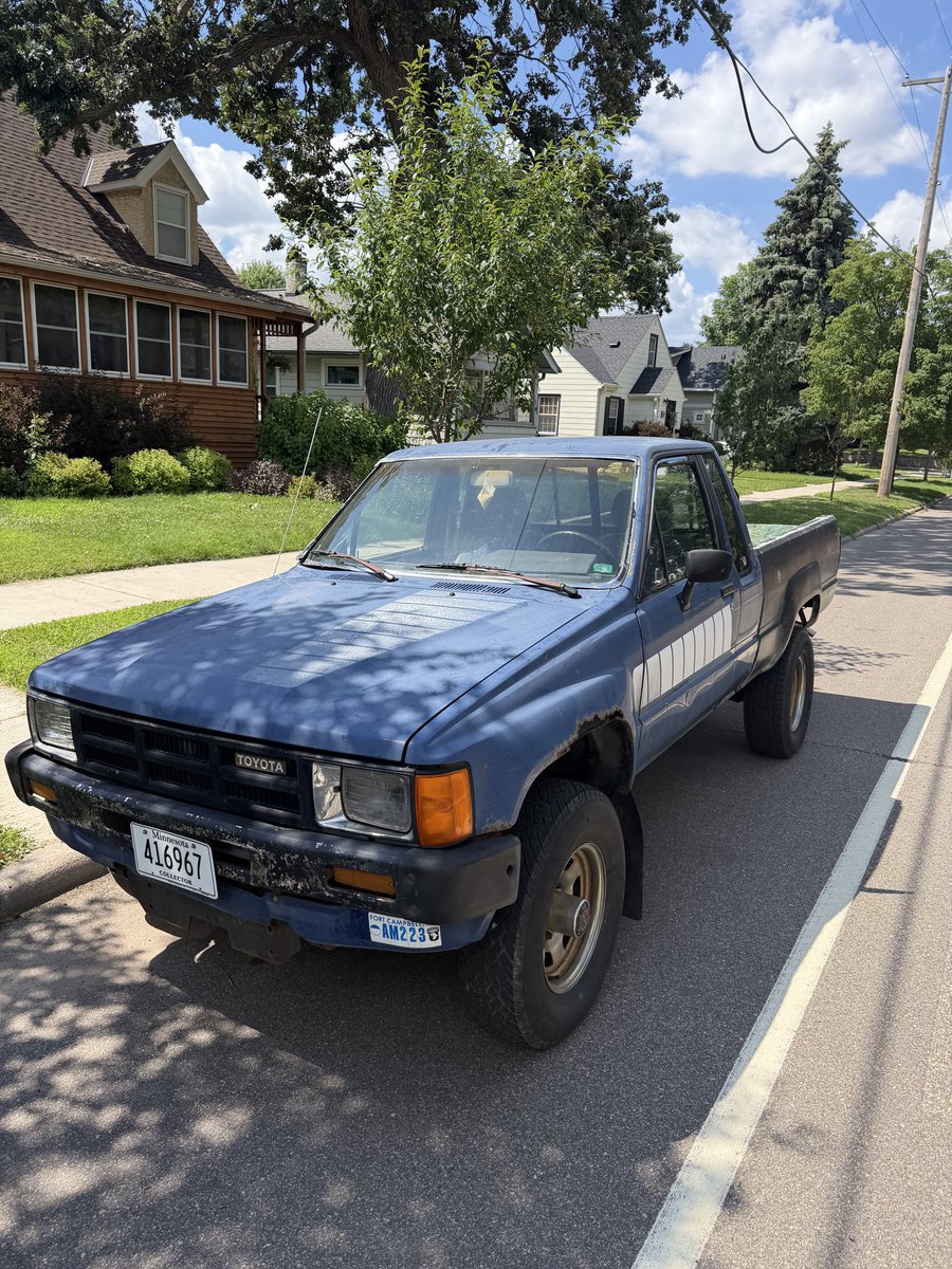 Alexgoesnorth's tweet photo. I bought a 1985 Toyota pickup for ideological reasons.

The owner’s manual says you should understand this truck as well as the people who built it. It shows you how to do EVERYTHING. 

A socket set and a Phillips screwdriver take apart 99% of it. No advanced automotive equipment or degree.

This truck is from the beginning of fuel injection, and before cars became complex computers.

And it’s blue. Actual 80s blue. Why did we stop building cars with beauty? When I restore it, this little truck will light up a road full of black, grey, and white.

This truck is borderline immortal. Thats the reason they’re the truck of choice for the Taliban. 

And finally as cars turn into surveillance devices you rent and can’t repair, a machine you fully own, understand, and can fix isn’t just nostalgia. It’s quite literally going to be the only way to remain free.