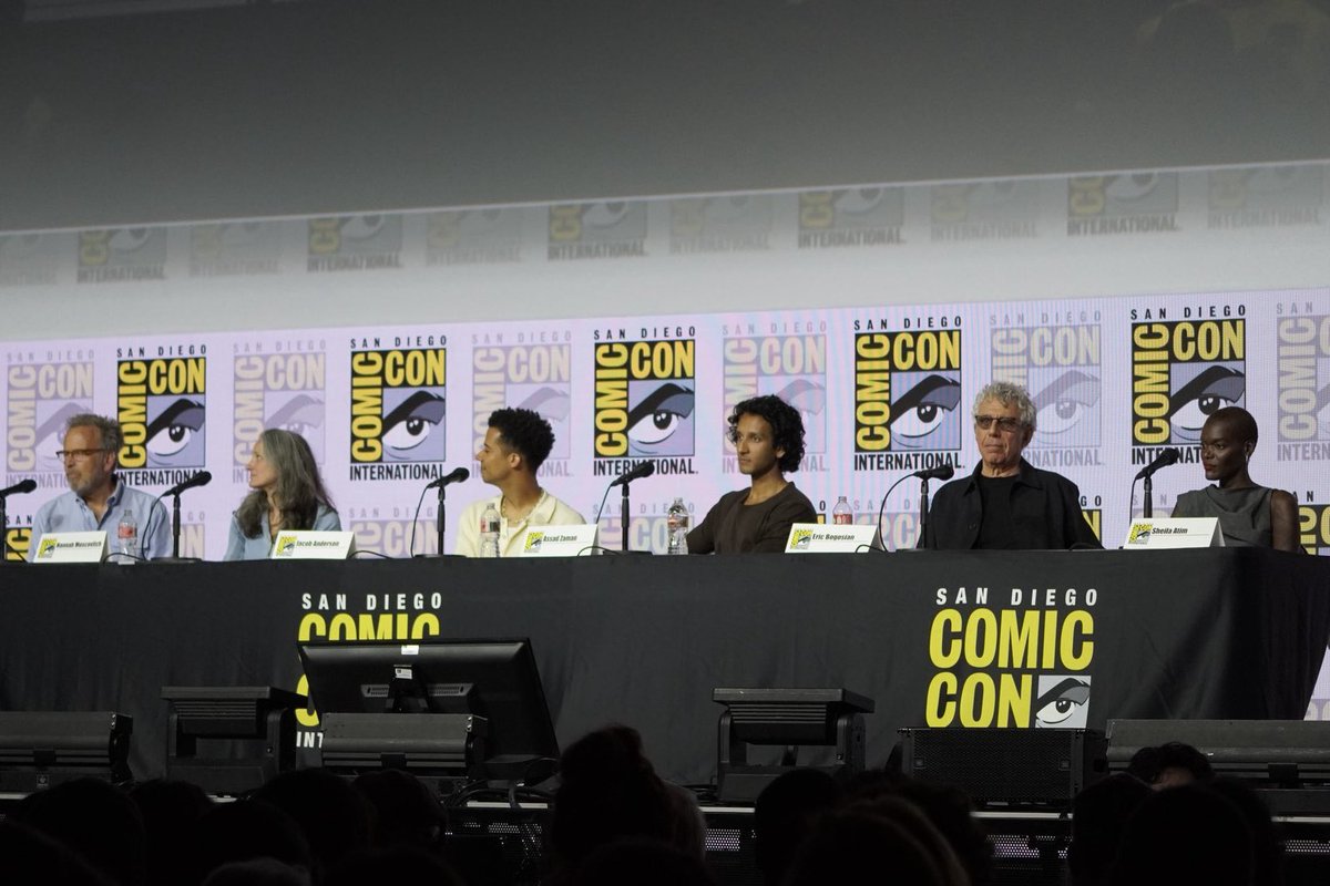 iwtvsource's tweet photo. Jacob Anderson, Assad Zaman, Eric Bogosian, Hannah Moscovitch and Mark Johnson are joined by the amazing Sheila Atim for the #TheVampireLestat panel in Hall H at #SDCC2026! https://t.co/ufrdnaAlNU