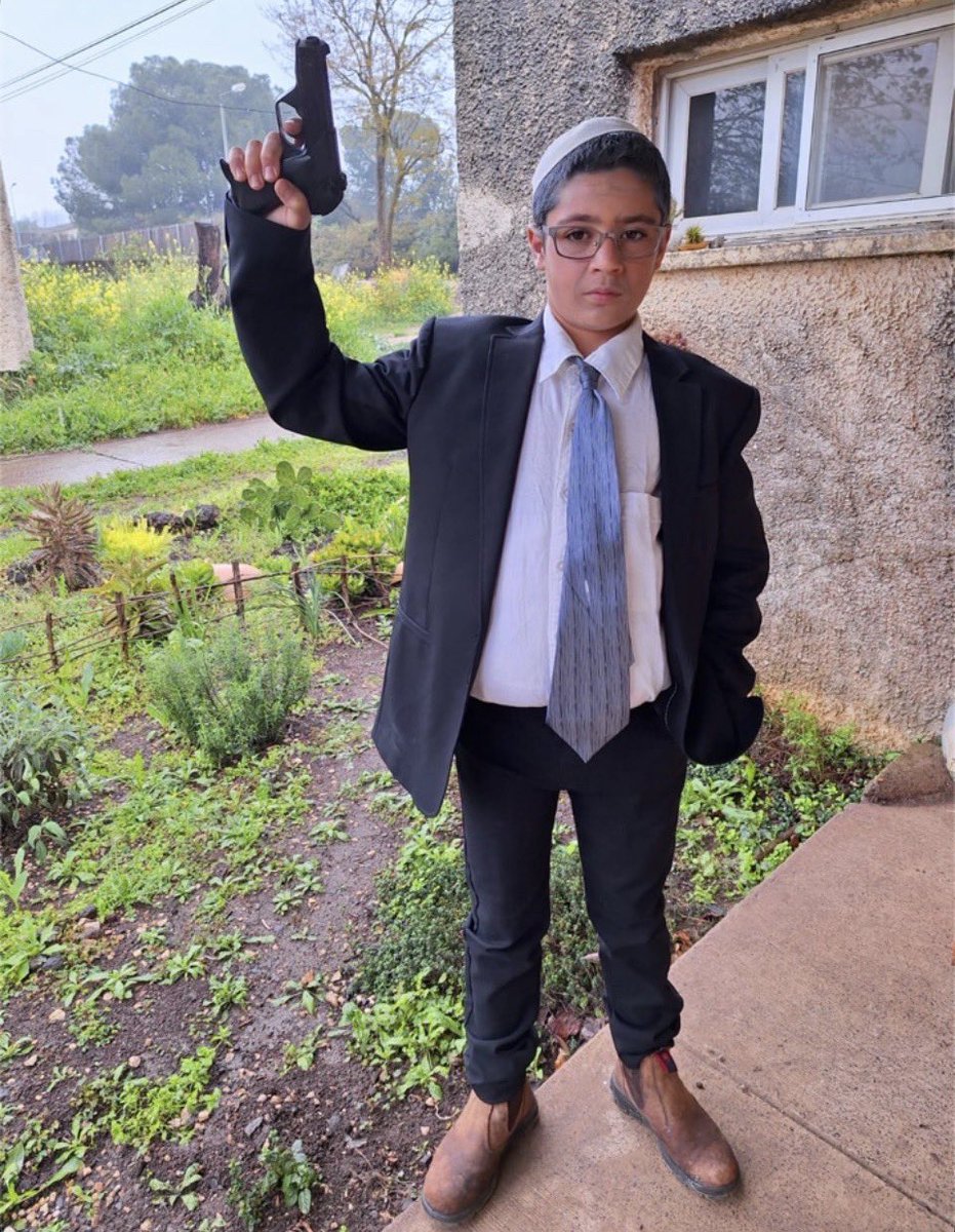 Parodyjeffx's tweet photo. In the West Bank, Jewish settler children are dressing up as Ben-Gvir with guns in their hands, treating him like a superhero.

This is Israel’s next generation. https://t.co/pVNdnmg5ZY