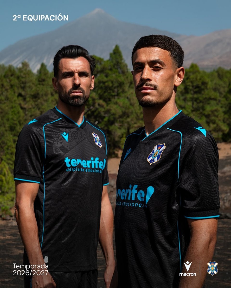 Footy_Headlines's tweet photo. 𝑵𝒐 𝑴𝒐𝒓𝒆 𝑯𝒖𝒎𝒎𝒆𝒍: 𝑴𝒂𝒄𝒓𝒐𝒏 𝑪𝑫 𝑻𝒆𝒏𝒆𝒓𝒊𝒇𝒆 𝟐𝟔-𝟐𝟕 𝑨𝒘𝒂𝒚 𝑲𝒊𝒕 𝑹𝒆𝒍𝒆𝒂𝒔𝒆𝒅

Spanish club CD Tenerife has officially launched its new away kit for the 26-27 season. Made by Macron, the shirt features a distinctive look inspired by the natural landscape of the island.

Under the theme of being born from lava and passion, the Tenerife 26-27 away jersey incorporates volcanic elements into its design. The look pays tribute to the club's proud origins and the unique geography of the Canary Islands, providing a strong connection to the local community.

The new Macron CD Tenerife 26-27 away shirt will be available to purchase starting Monday, July 27, 2026. Fans can buy the kit through the club's official online store and physical retail locations.
