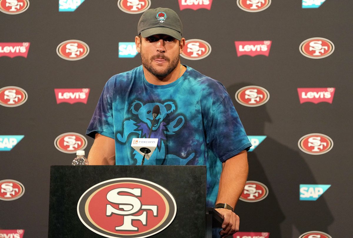 SFGate's tweet photo. The Nick Bosa-Ryan Clark beef, from a MAGA hat to a single emoji https://t.co/5QvArs2lom https://t.co/41LE5mRmRr