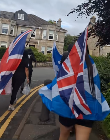 joe_yer99's tweet photo. Scottish patriots in East Kilbride. should they dug wallopers no be protesting aboot fuckin roundabouts. weird flag ensemble, pretty sure these are the same cunts who go to orange w..... ok stop it Joe. They're patriots. https://t.co/6SXB6Wi10q