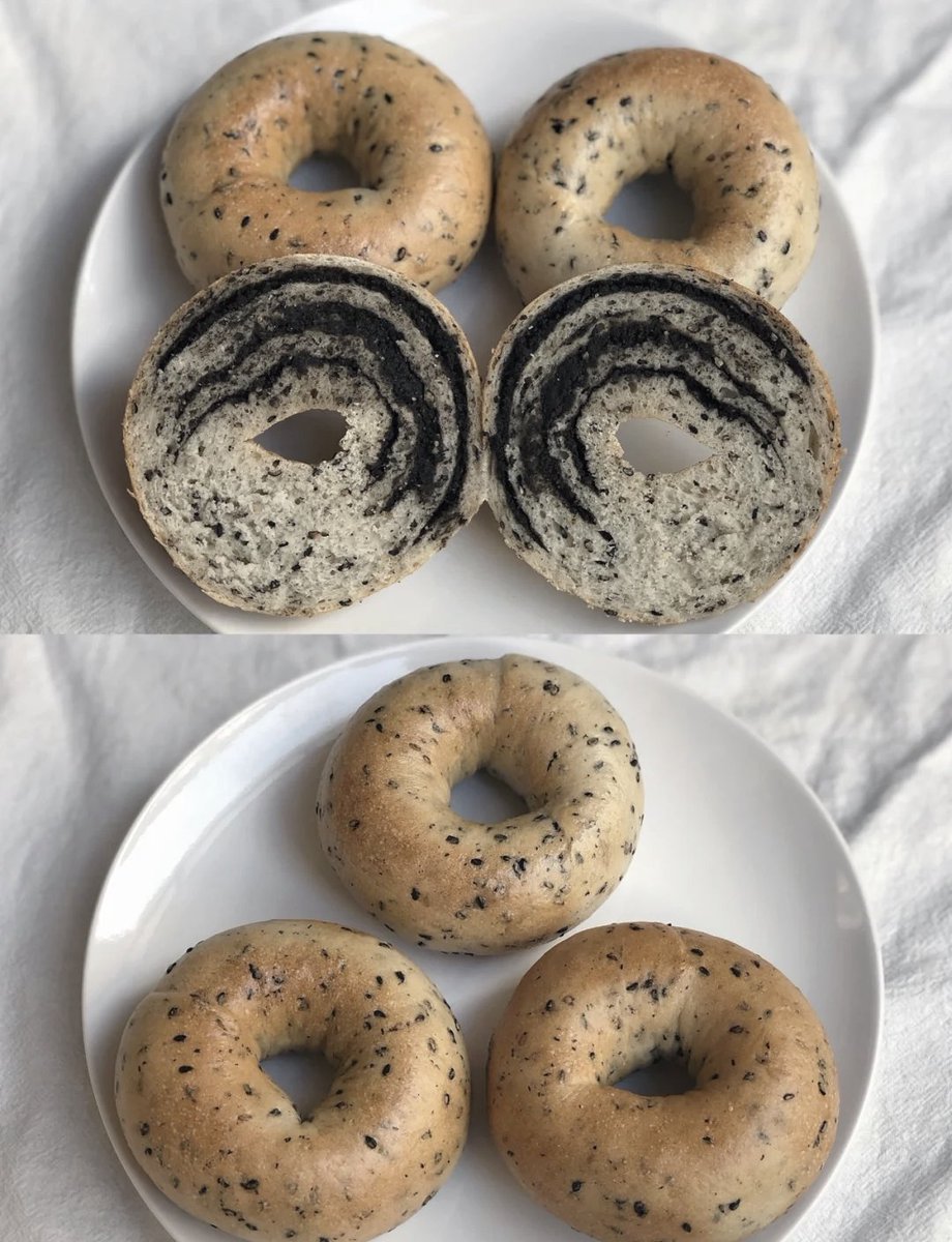DrenchedZ's tweet photo. Just pulled my first homemade sesame bagels fresh out the oven—crunchy crust, chewy inside, and still warm enough to melt a slice of brie on top. Dinner’s already sorted, and the whole apartment smells like heaven. https://t.co/UwKfVdN4hQ
