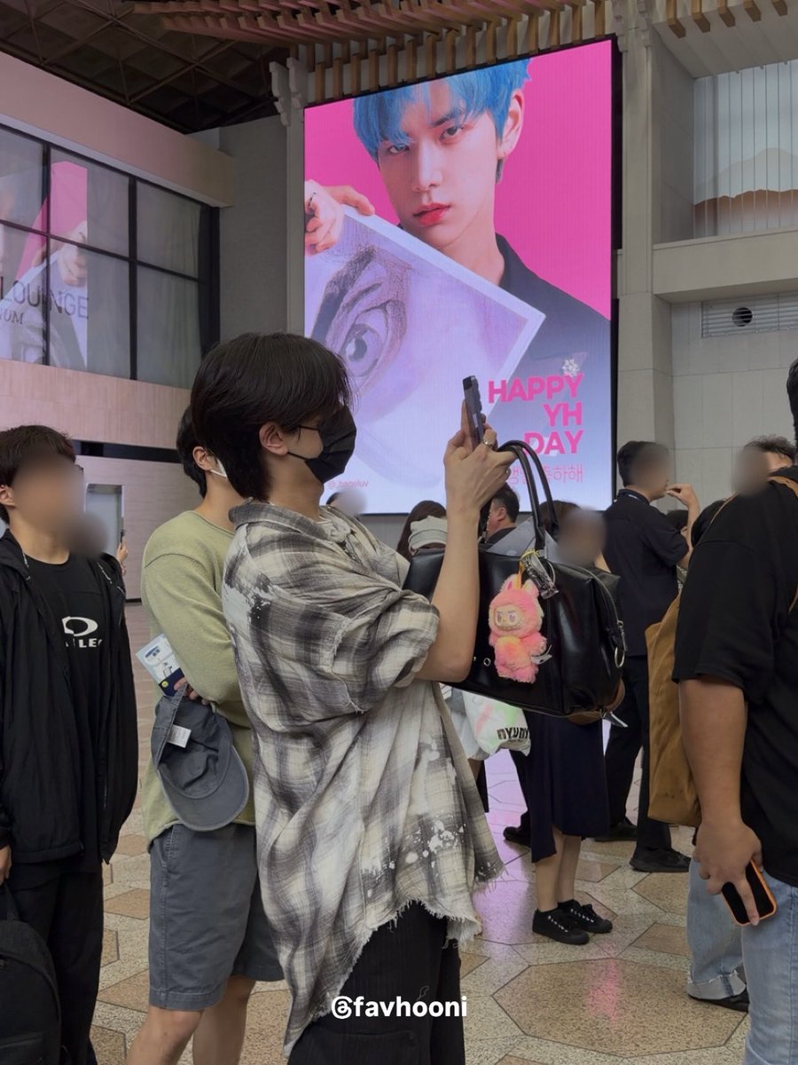 KYH_Global's tweet photo. Younghoon taking photos of his birthday ad at Gimpo Airport 📸 https://t.co/Mc0t5wuAIu