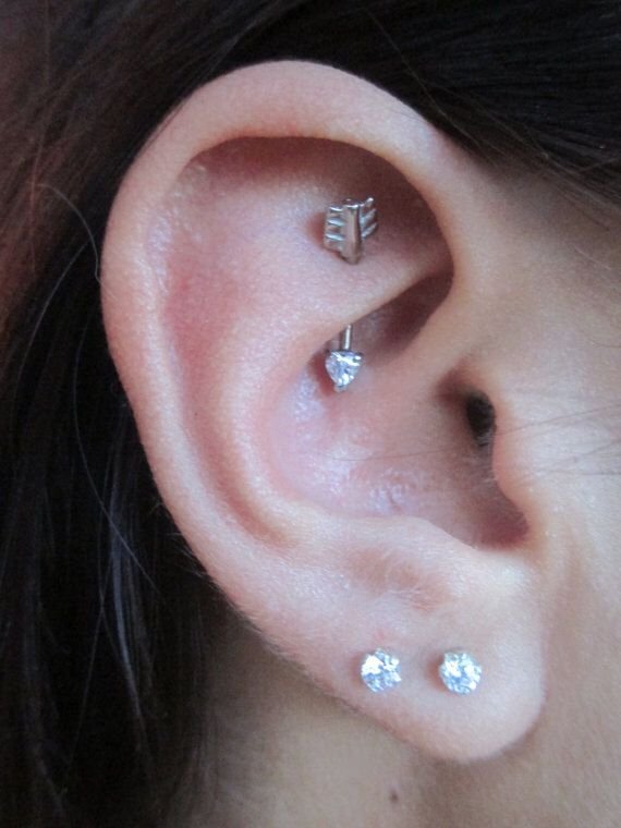 Lunaticc15's tweet photo. OKAY WAIT imagine a rook peircing (yes thats what the placement is called) but with an arrow stud im kind of surprised I could find a pic of this exact thing
This is a dream peircing for me, I heard rooks are kinda crunchy tho https://t.co/FY3433lZSn