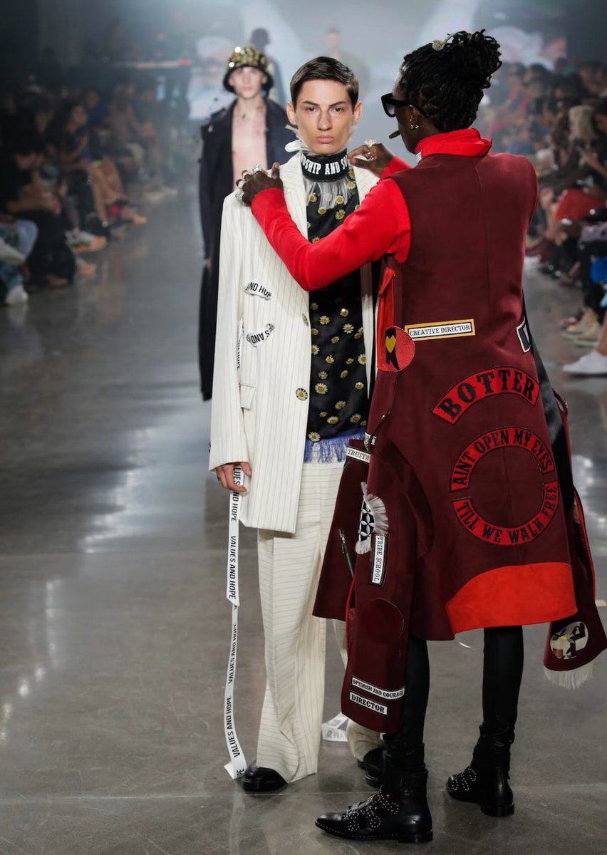 Onlyifyoucouldd's tweet photo. Young Thug’s iconic 2016 VFILES runway moment stopping a model mid-walk to fix his collar while wearing “Rushemy Botter Trench coat” https://t.co/60ZaVbhcEp