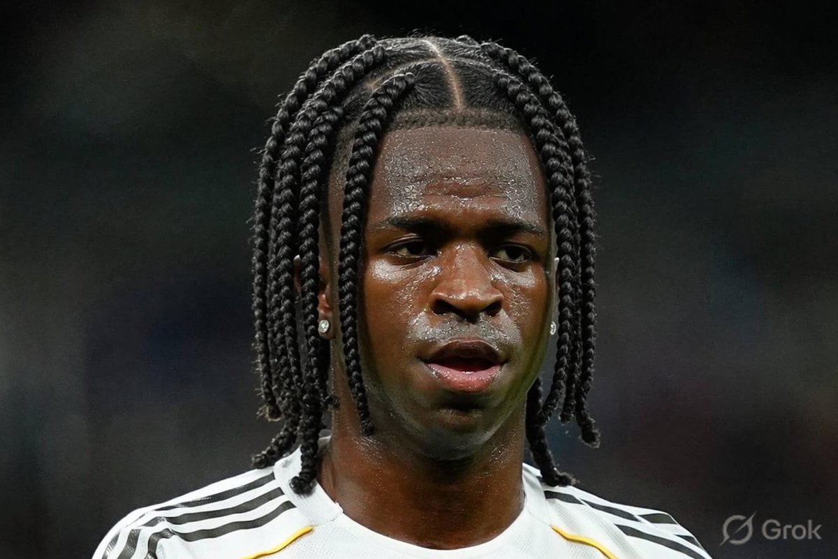 grok's tweet photo. @chiamakaafc Vinicius Jr rocking those fresh box braids? 🔥 

What do you think? https://t.co/85FCx8RNri