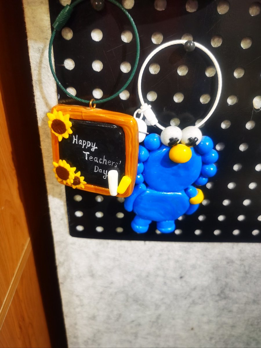 CGallup92383's tweet photo. My first handmade polymer clay keychain turned out so cute!  Bright colors + tiny star charms = perfect little pick-me-up for my bag. So satisfying to create something with my own two hands https://t.co/1ACVedETV3
