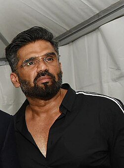 KanojiaPJ's tweet photo. Hello @SunielVShetty ,

Does your granddaughter still feed laddus to Narendra Modi's photo, the same Narendra Modi under whose government students were lathi-charged and hit with pellet guns?

Why are you silent? Your father must be ashamed of you! 

Just asking. https://t.co/MH6kkxx7KT