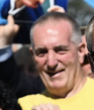 HullDockster's tweet photo. @Nigel_Farage AI Slop.

Look at the shadows on people's necks. Are there 2 suns in Clacton?
Also, several very deformed hands. https://t.co/lGrDvtGe0x