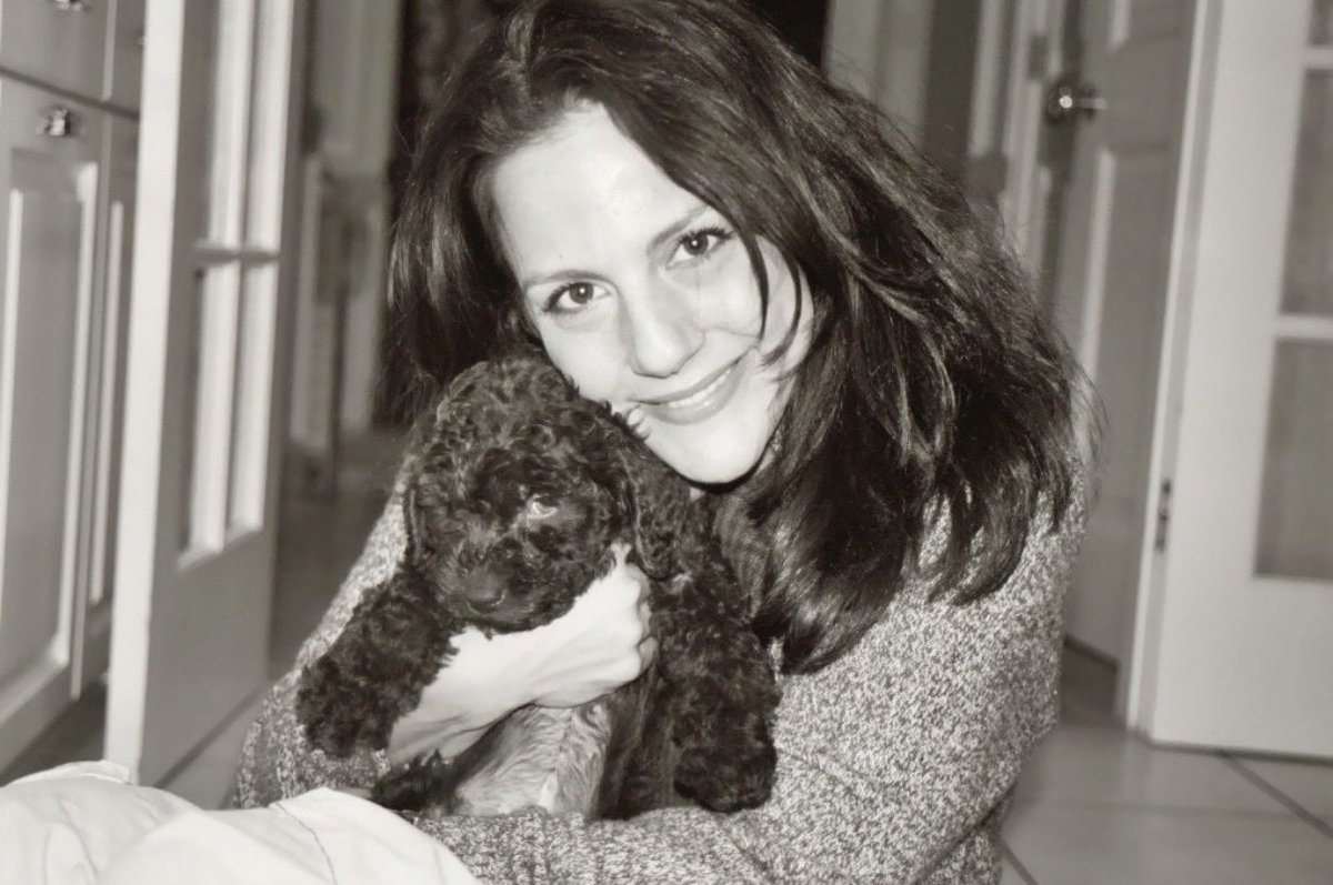AdamSchefter's tweet photo. Ella arrived at Newark Airport from Bellingham, Washington, in the middle of the night, January 2007. We were there waiting to welcome her, comfort her, and clean her off after a cross-country flight that changed her and our lives forever.
 
She was a part of our family before we even became a family. Ella joined us before we married, before our son grew up, before our daughter was born, before we added four more dogs.
 
She was a little chocolate brown labradoodle, who proved her strength and fierceness early on when she brought a dead baby bunny back into our house.
 
She was, as my wife called her, my “constant companion.” Long before the pandemic and even after it, she quietly sat in my office, hearing every conversation, watching every live shot, knowing all the news before it was reported. She didn’t care what the stories were; she just was happy being with me.
 
When she did leave my office, she loved walks and car rides. She always knew which button to push to lower the window so she could stick her head out and feel the wind in her face.
 
Over the years, the rides and walks became more infrequent. She lost her vision and hearing. She developed doggy dementia, which led to seizures and breathing issues. She was in diapers. Her dark chocolate brown coat turned gray. But as much as her life changed, she was most happy in our arms or in our bed, laying with us, licking our faces.
 
Yet Ella’s good days dwindled, and as tough as it was – and we agonized over it -- it became time to let her go. We did that Thursday, an all-time sad day.
 
For the third time in just over 18 months, we lost one of our beloved furry friends, our other children. We lost Benny in January 2025, Bailey this March, and now Ella. It’s too much. We now are down to two dogs, Apple and Brady. Our house feels empty and our hearts feel broke. Ella’s pain has been transferred to us.
 
Ella lived almost 20 years – she would have been 20 in November - and was a part of our graduations, celebrations, happy and sad moments. We know what we had and what she meant. But for all the time we had together -- and it was more than most get -- it still wasn’t enough.
 
We always will remember and love our little Ellies.