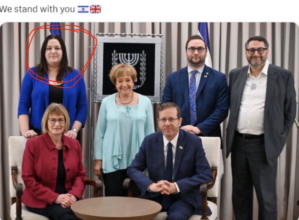 JohnStealer's tweet photo. Andy Burnham has given Israeli asset Ruth Smeeth a promotion!

She’s now ‘Northern Ireland minister and Lords Deputy Chief Whip.’

Seen here posing with Isaac Herzog who said.  

"It is an entire nation out there that is responsible," Even babies. 

This is change under Burnham https://t.co/E8G9IxVYUQ