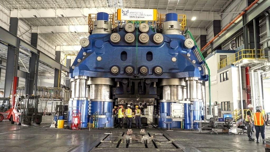 Arkasiraee's tweet photo. A giant forging press is one of the most powerful machines ever built by industry. These massive systems can exert 50,000-100,000 tonnes of force, using enormous hydraulic cylinders driven by highly pressurised oil. 

But the true engineering challenge is not generating this force it is controlling it with precision as one wrong actuation could destroy the press. 

Inside these machines are hydraulic systems operating at 250-700 bar pressure, where thousands of litres of oil are pushed through precision-engineered valves to move pistons weighing hundreds of tonnes. 

The hydraulic cylinders are built from ultra-high-strength alloy steels designed to survive repeated extreme loads, while servo valves with internal clearances of only a few micrometres regulate oil flow in milliseconds. 

Advanced sensors continuously monitor position with extreme precision, pressure, and force, allowing control systems to adjust the press thousands of times per second.

The scale is extraordinary, a single forging press can cost $100-500+ million, with complete facilities exceeding $1 billion. Building one requires expertise in massive steel manufacturing, precision machining, high-pressure hydraulics, and control engineering that only a handful of industrial nations possess.

A forging press may look like a machine built around brute force, but its real achievement is precision under unimaginable loads turning thousands of tonnes of hydraulic pressure into controlled deformation at the atomic level of metals. 

This capability creates the ultra-high-strength forgings that form the backbone of modern aviation, space exploration, nuclear energy, power generation, defence, and heavy industry, where material failure is not an option.