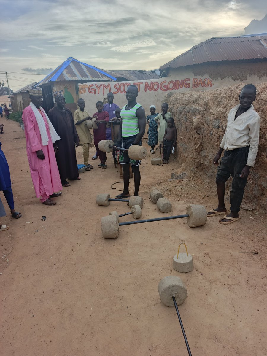 ProfAbdullahi_v's tweet photo. Today, I was simply taking a walk through the streets of Soba, Kaduna State, connecting with the grassroot when I came across something that made me stop and smile.

A group of young people had built their own gym from concrete, iron rods, and pure determination.

No imported equipment. No luxury fitness centre. Just local ingenuity, hard work, and a decision to spend their time building strength instead of getting into trouble.
