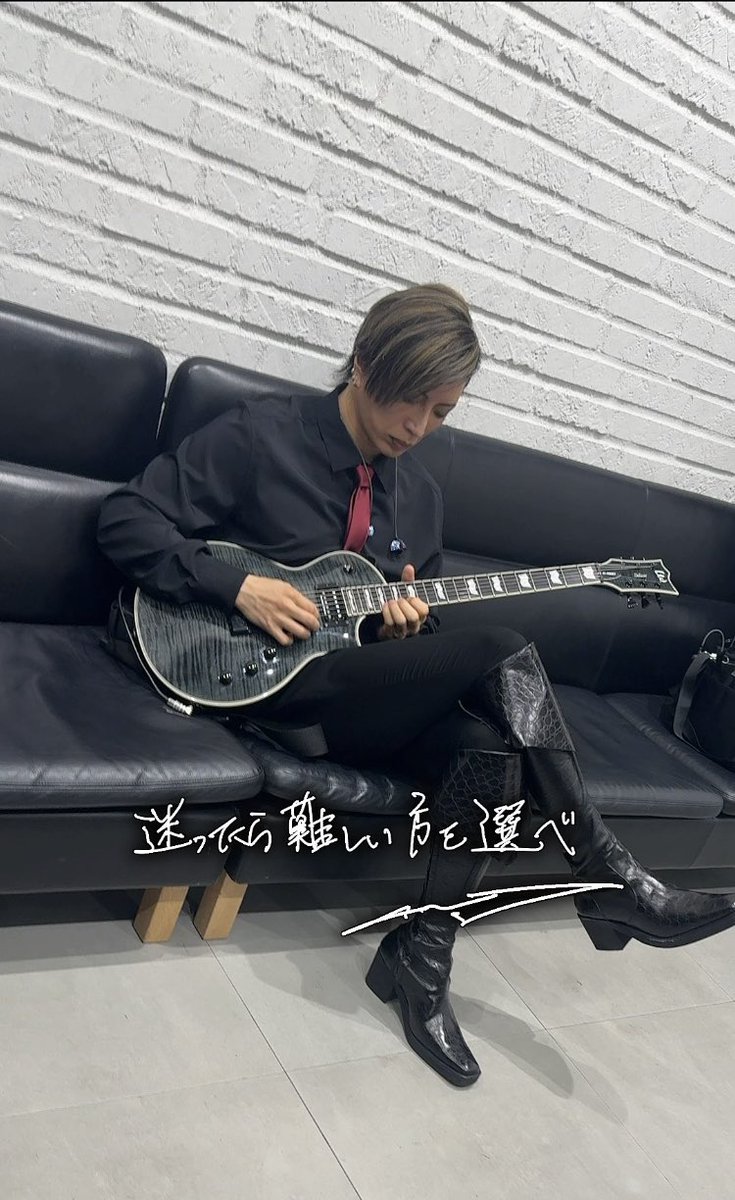 guitars are shaped like that so he can put his tiddy on there