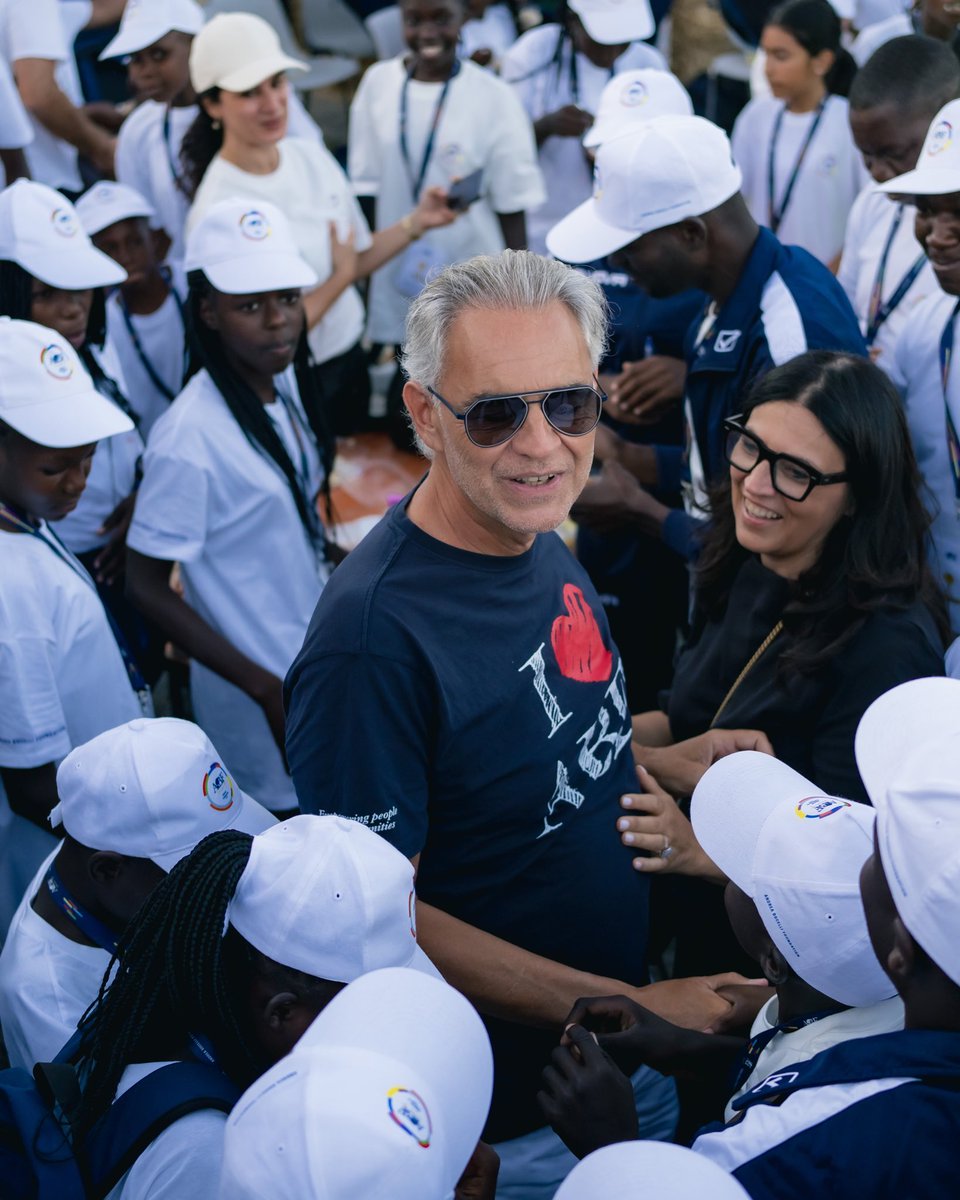abfoundation's tweet photo. Yesterday, the young choristers of ABF Voices Of took the stage at the #TeatrodelSilenzio for the dress rehearsal of the concert in which they will perform today alongside founding conductor Andrea Bocelli.​

It was a deeply moving moment for the girls, boys, young people, and choir directors from Haiti, Uganda, the Holy Land, Camerino, and Rione Sanità, who are currently sharing in the experience of the first ABF Global Gathering. ​

Tonight’s performance marks an important milestone in a journey built over time through choral practice, the encounter between different cultures, and the personal growth experienced within the educational communities of ABF Voices Of.