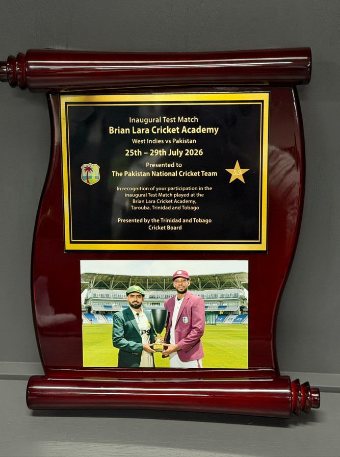TheRealPCB's tweet photo. 🇵🇰 Pakistan Cricket Team receives a commemorative plaque to mark the inaugural Test Match at Brian Lara Cricket Academy in Tarouba, Trinidad &amp; Tobago 🏏 🇹🇹

#WIvPAK | #PakistanCricket https://t.co/TioFqN2Ylh
