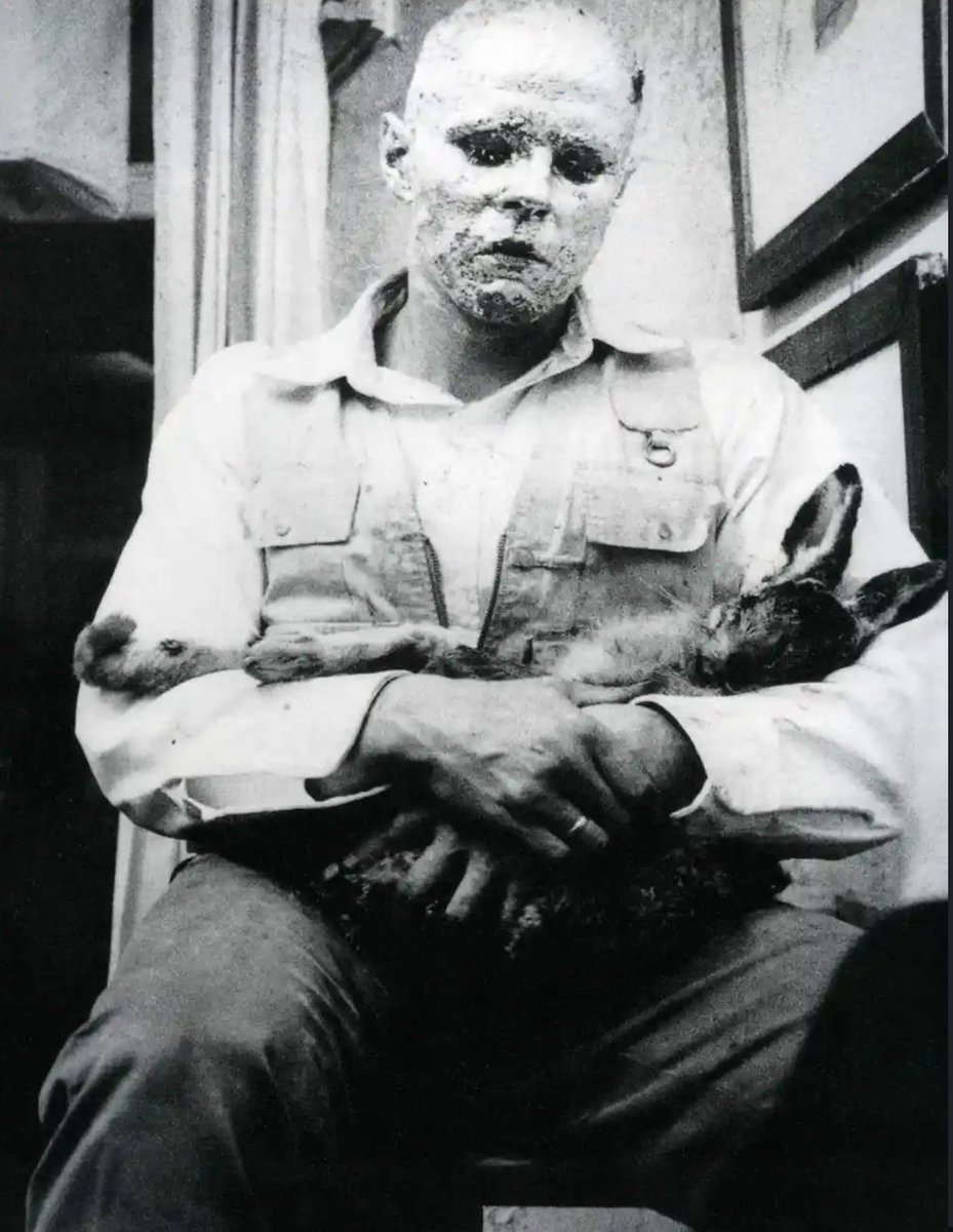 Myblackdiary93's tweet photo. how to explain pictures to a dead hare by joseph beuys (1965) https://t.co/sLehmFQrHu