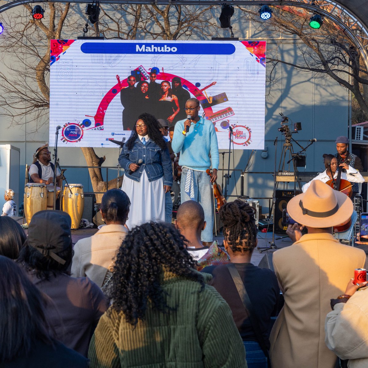 StandardBankArt's tweet photo. Mahubo delivered a performance of raw energy and artistry, fusing tradition with bold innovation. The audience was swept up in rhythms both ancestral and new, a powerful celebration of music’s healing spirit.  #J4YP2026 #MakingArtPossible #SBJoJ2026 https://t.co/4sW7heanjt