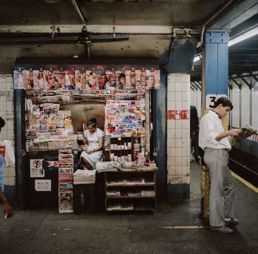 LKpaddy's tweet photo. Newsstand in the 34th Street station, 1985 • Janet Delaney • https://t.co/m98dH6ITPO