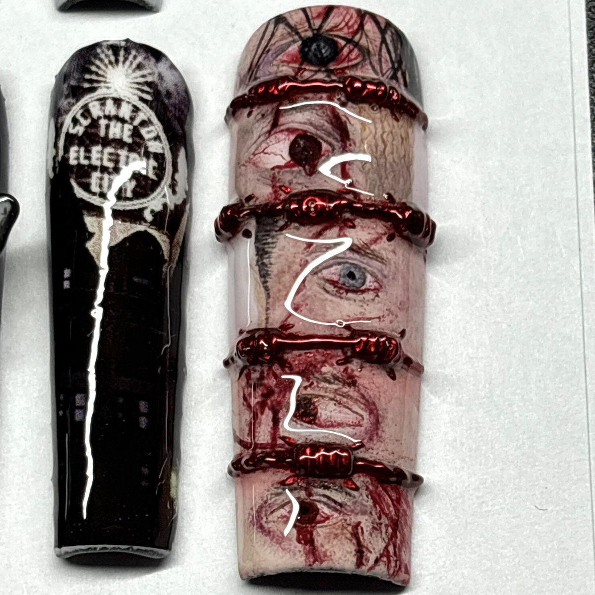 keiiyoku's tweet photo. 20 years of MIW in a nail set 🖤 
every nail hand painted &amp; crafted by me (except for the 570/graveyard shift nail) https://t.co/bzf5PfBHia