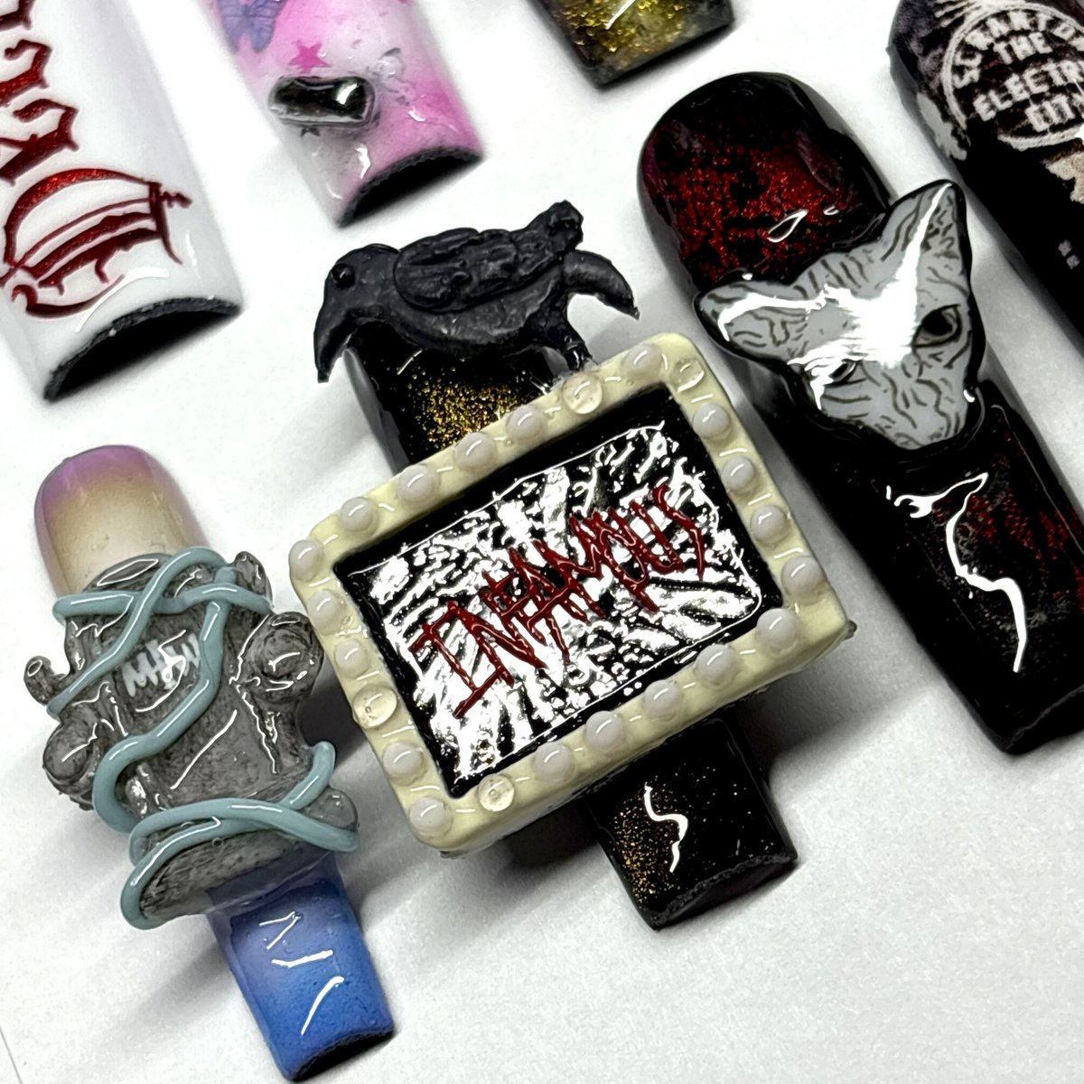 keiiyoku's tweet photo. 20 years of MIW in a nail set 🖤 
every nail hand painted &amp; crafted by me (except for the 570/graveyard shift nail) https://t.co/bzf5PfBHia