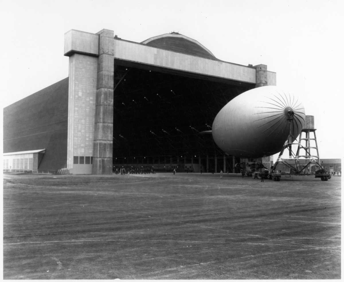 Bedwig_55's tweet photo. Hangar B is 1,072 feet long, 296 feet wide, and 192 feet tall — one of the largest clear-span wooden structures ever built. Constructed in 1943 for Navy K-ships of Squadron ZP-33 that patrolled the Pacific coast.
December 2025 winds tore open a major roof section. The Port is removing the damaged material starting early August. Private funds are still required for the local match, assessment, and next stabilization steps.
$50 covers materials for temporary weather protection on a section of the damaged area. Every dollar strengthens the case while options remain open.
Donate here (tax-deductible via FOTAM):
https://t.co/YqMddFFVOG
#SaveHangarB #WWIIHistory #AviationHeritage