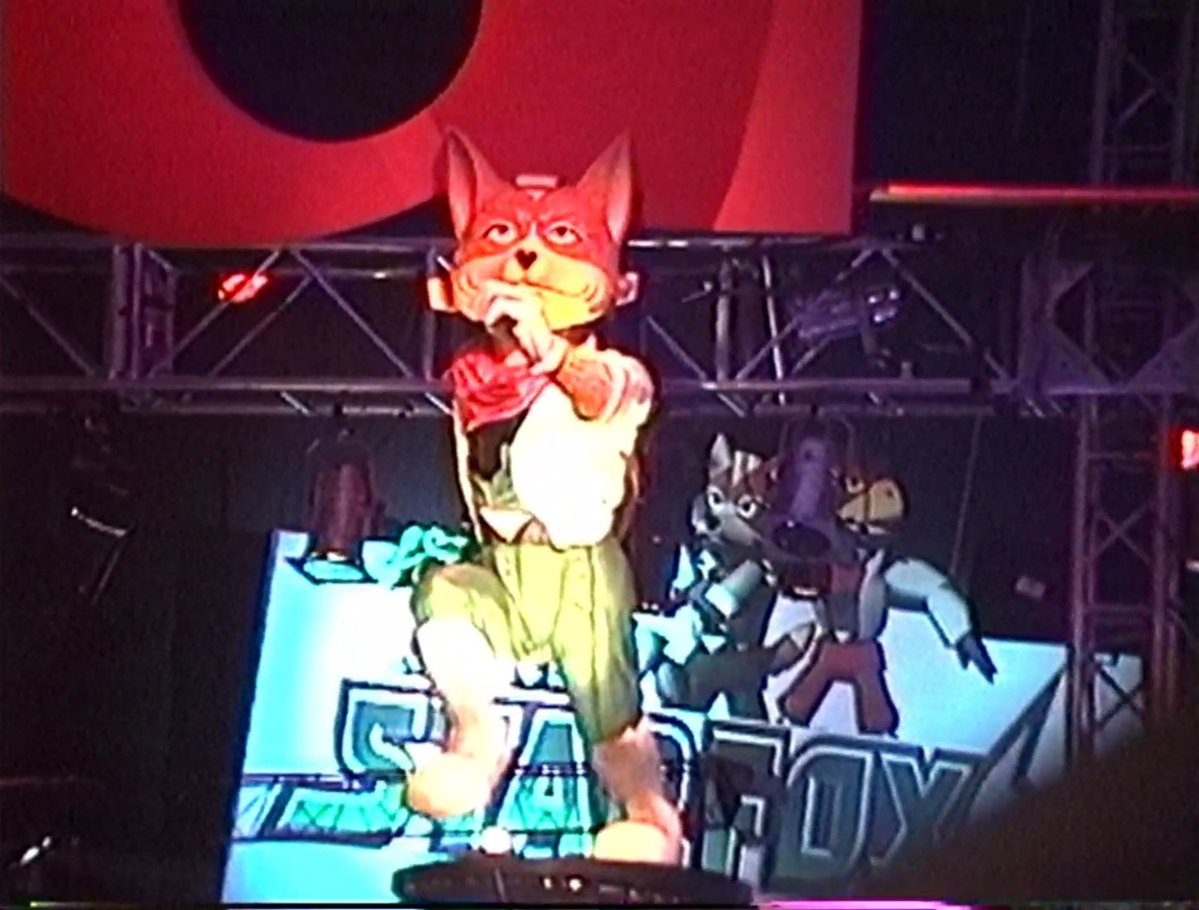AndrossSF0's tweet photo. E3 1997 with a look at Nintendo's Star Fox 64 booth featuring a statue of Fox McCloud admist other Nintendo characters outside the booth &amp; the game being playable from several TV monitors.

#starfox #starfox64 #n64 #nintendo64 #Nintendo https://t.co/tKRoiMblrm