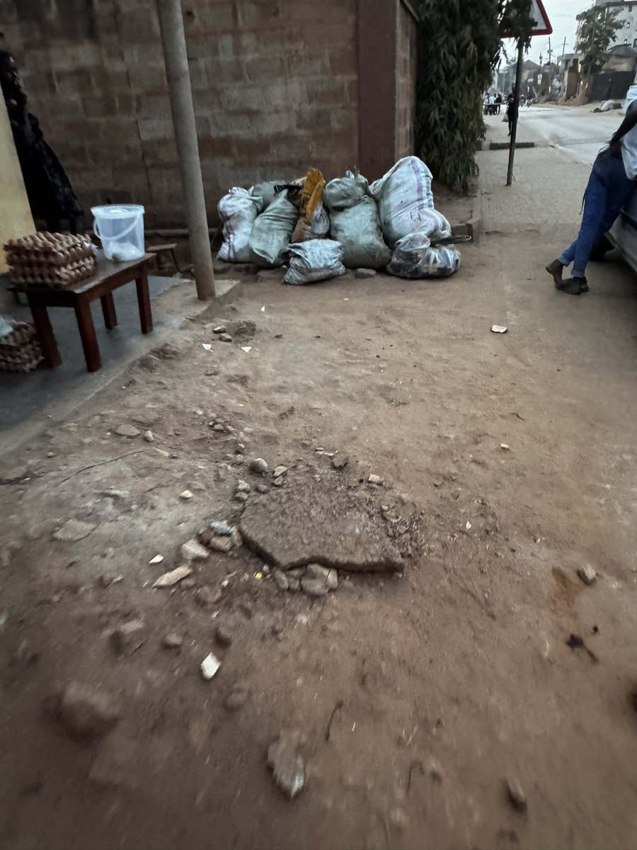 GodwinTOKO's tweet photo. It's 7 pm, hours since @PoliceUg took back their guns, & the @UgandaMediaCent turned off their cameras, yet the rubbish remains where it was left! Some of it blocking the walkway, & pausing a safety hazard for pedestrians! Should it rain in the night, boom!

See the problem of rushing a policy because you want to show power & get social media likes without thinking them through, @KCCAUG & @OPMUganda?!